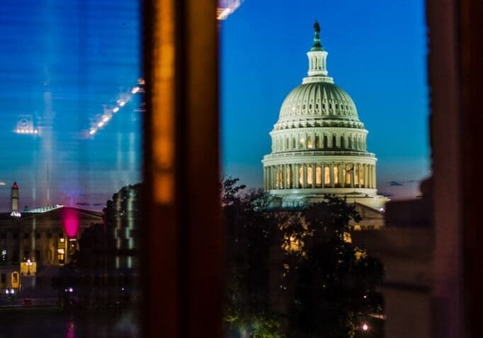 A view of the capitol building from an apartment window.